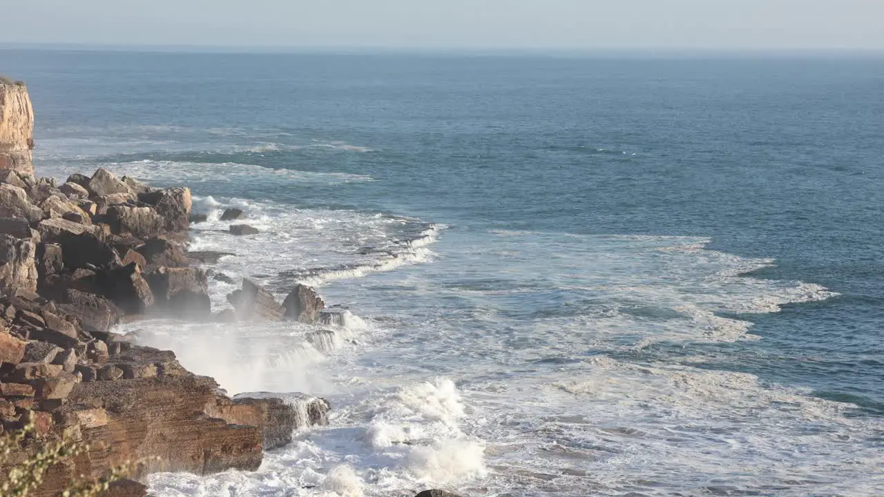 foam explosion against the cliff