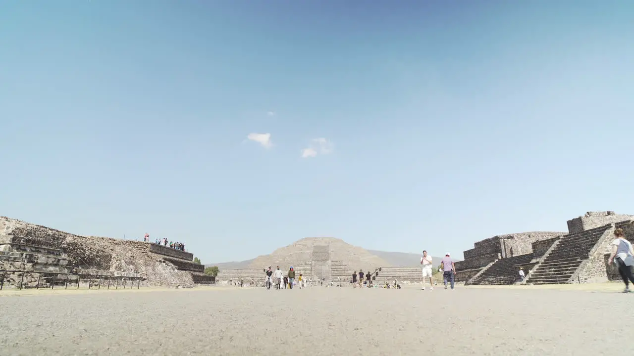 Travel tourists enjoy the Teotihuacan Pyramids outside of Mexico City Mexico on a sunny day