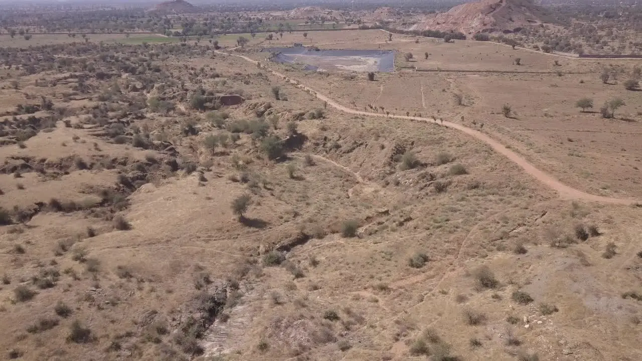 Drone Flying Over The Broad Barren Lands In Rajasthan India On A Sunny Day aerial