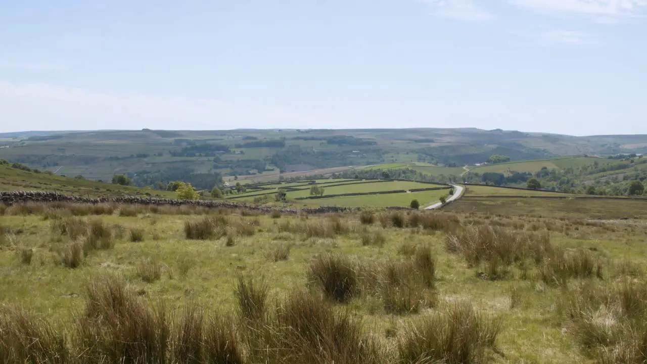 Slow pan of the wild and untamed moors of Yorkshire on a clear and sunny day