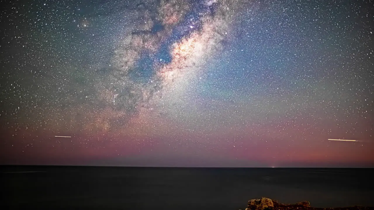 Hyper Lapse of the Milky Way Galaxy Long Exposure Moving Across Sky Star Trails Aeroplane Flying Starry Sky Wide Angle Static