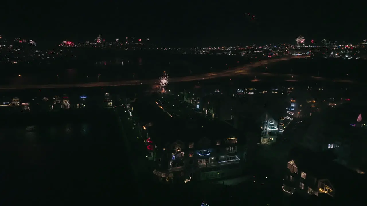 Midnight spectacular firework display above city Reykjavik closeup drone