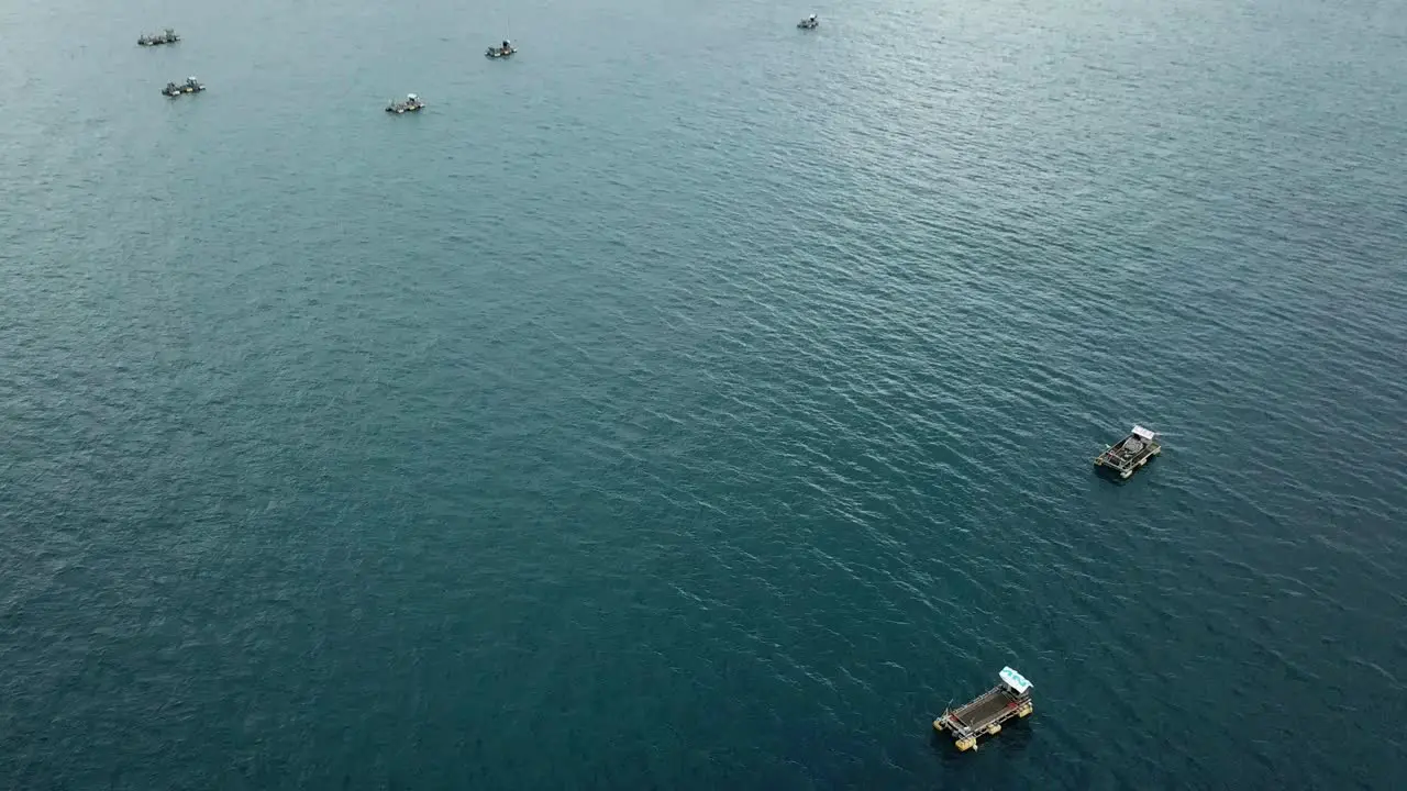 AERIAL 4K Panning Shot Lobster Traps in Lombok Indonesia Ocean