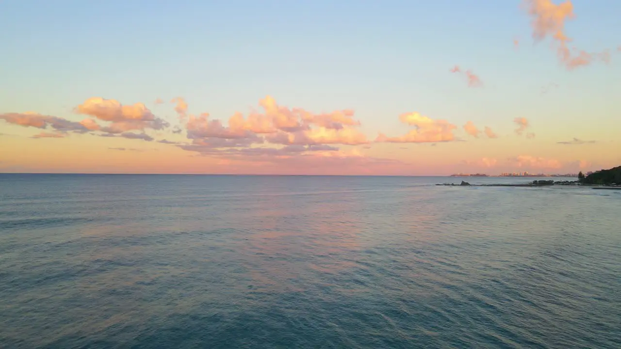 Panorama Of Turquoise Blue Water Of The Palm Beach In Queensland Australia At Sundown