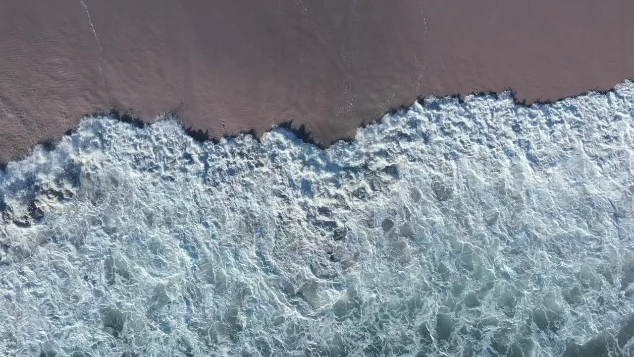 Top View Of Breaking Foamy Waves At Blouberg Beach During Summer In Cape Town South Africa