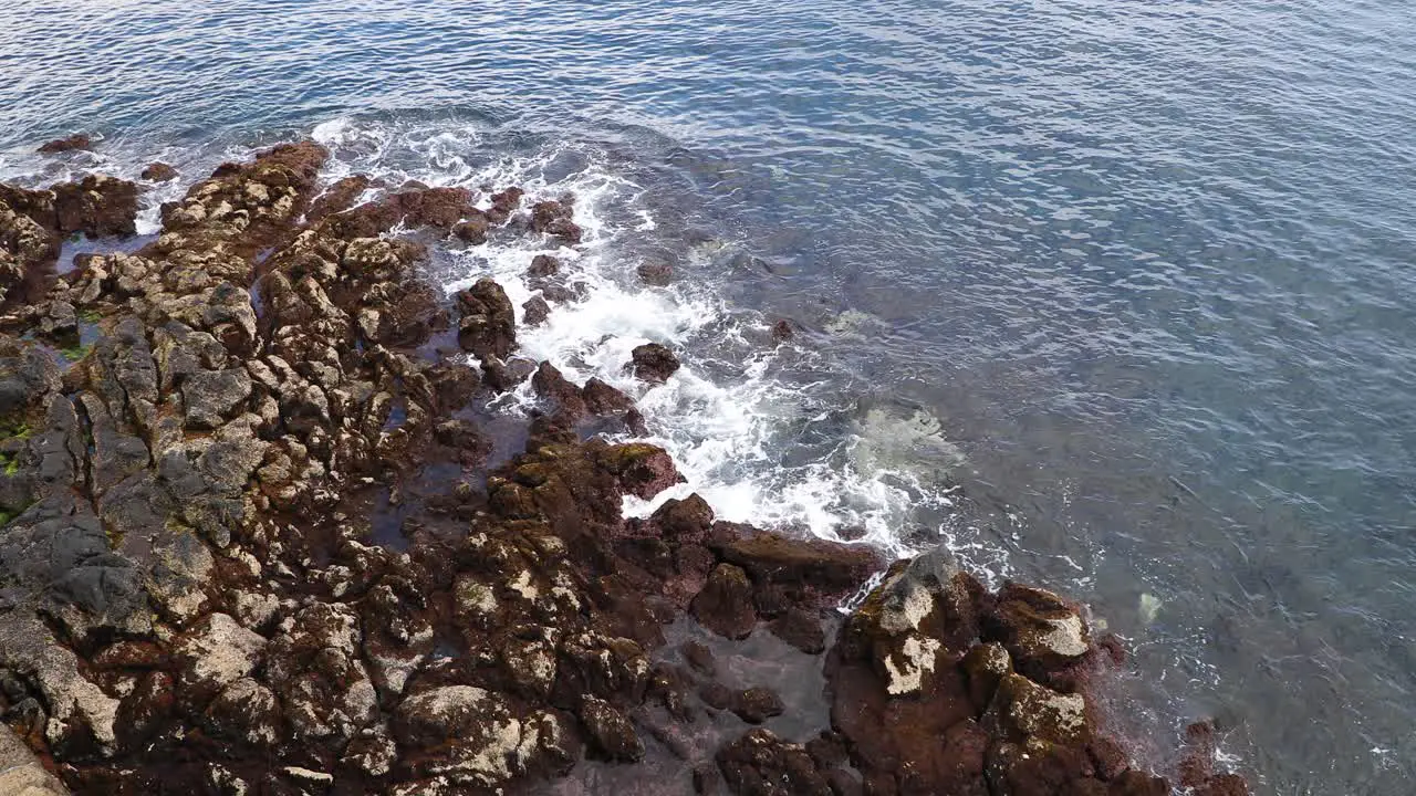 Waves Crashing On The Rocky Shore Of Angra do Heroísmo Bay In Terceira Island Portugal