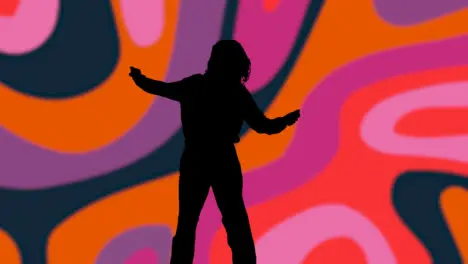 Studio Silhouette Of Woman Dancing Against Multi Coloured Pattern Background 1