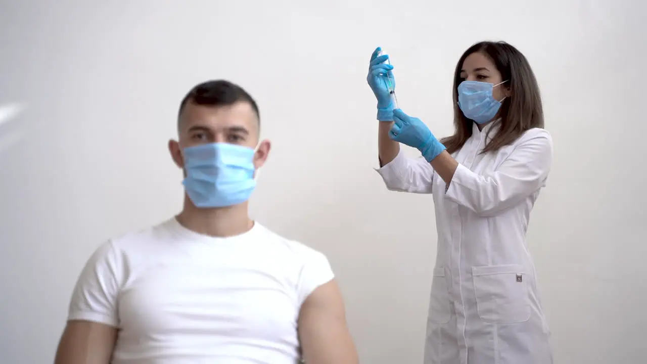 Male Patient Waits For Injection