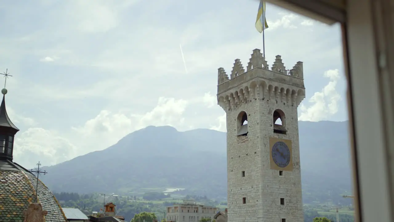 View Through Window Of Verona Tower With Flag On Clear Day