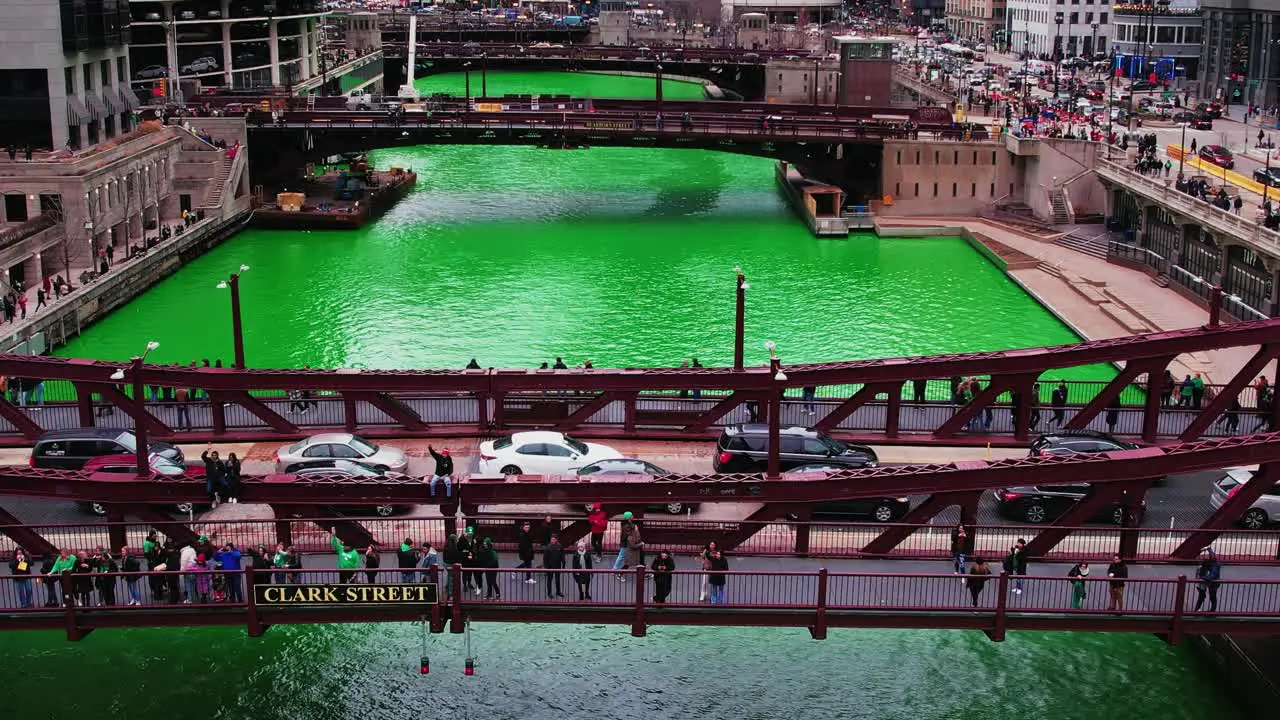 people on top of Clark Street Bridge during Saint Patricks day in chicago