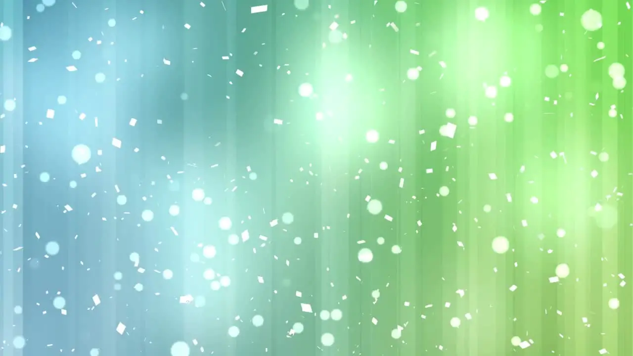 White confetti and white spots against green and blue gradient striped background