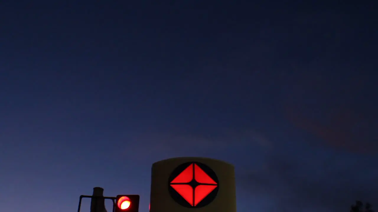 Arco Gas Station Gasoline Price Sign Dusk Pan Down From Sky