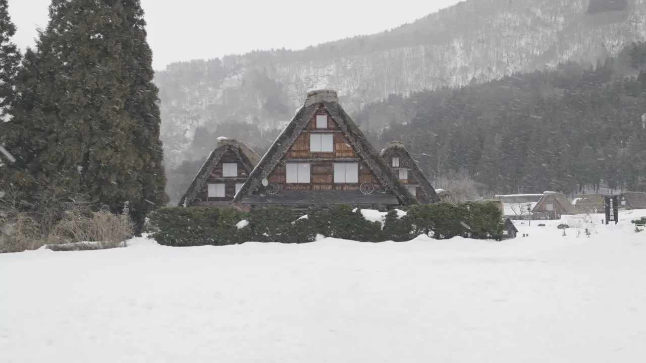 Three traditional houses in the small traditional village of Shirakawago in the Japanese Alps