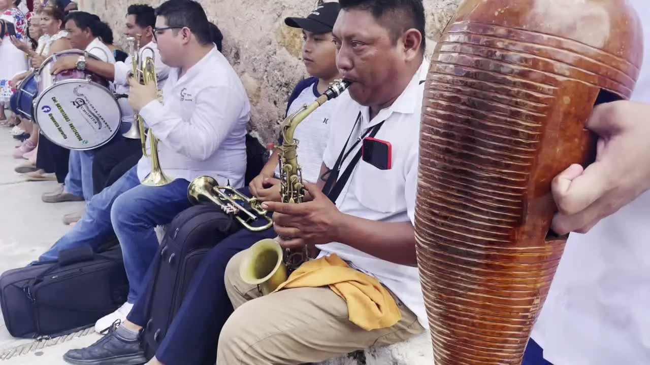 band play for celebration with sax and guiro traditional instrument of Yucatan