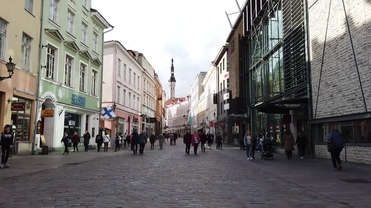 Beautiful street of Tallinn old town while people are walking