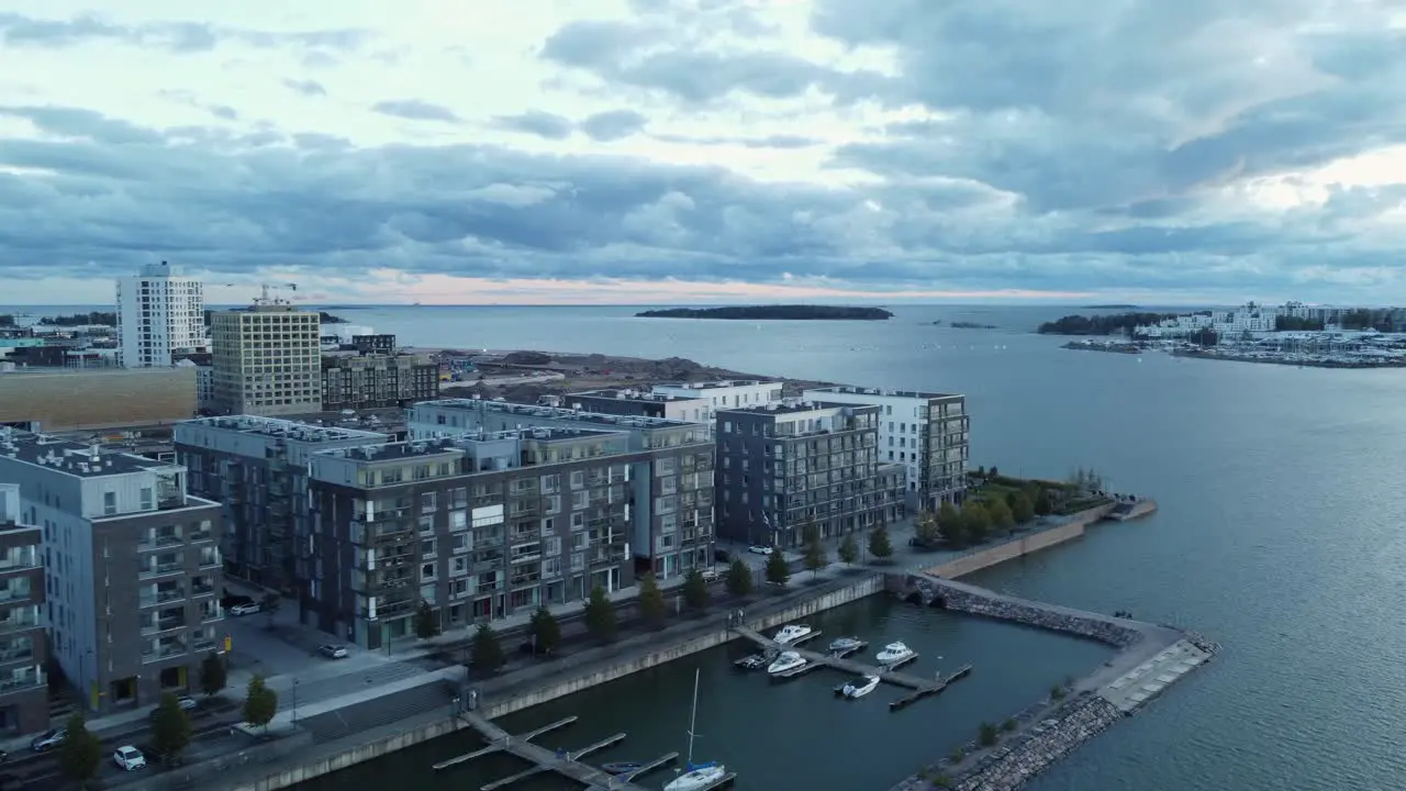 Stone breakwater protects marina in trendy Baltic waterfront Helsinki