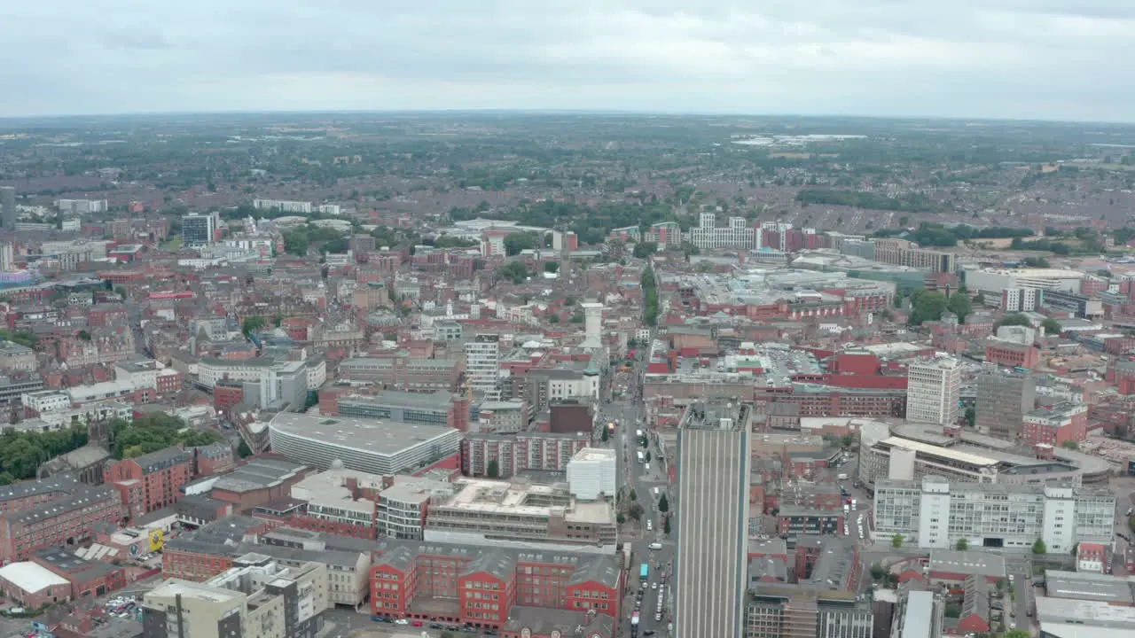 Wide circling drone shot of Leicester city centre