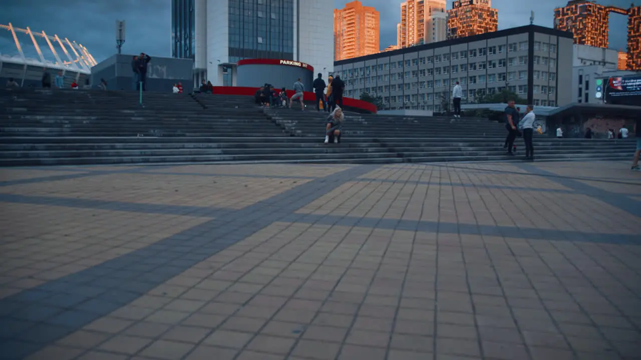 People moving city background in downtown urban area at evening