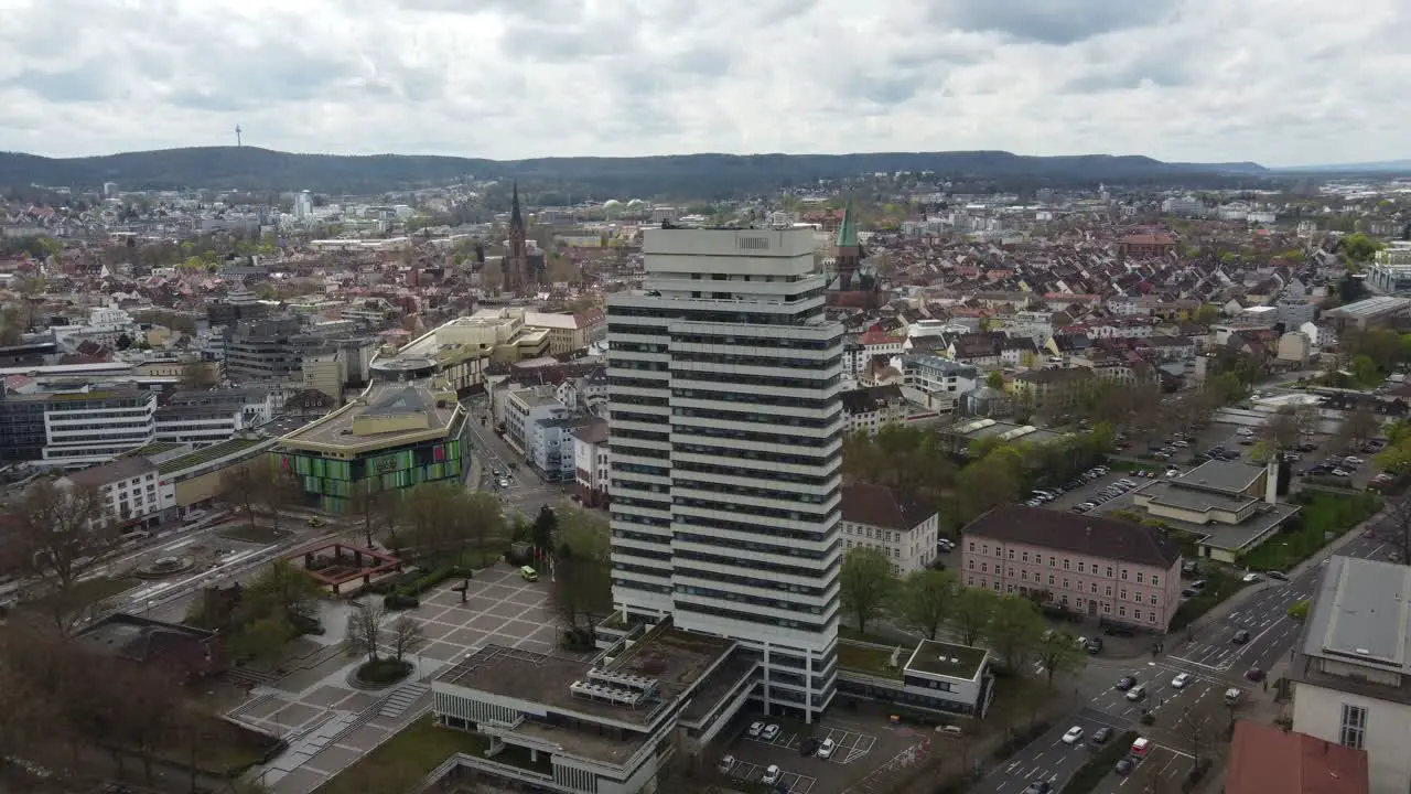 Aerial cityscape of Downtown Kaiserslautern city traffic with its town hall and shopping mall Germany