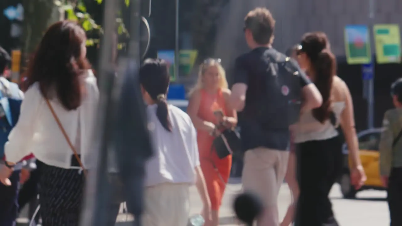 Cinematic shot of the crowd of people walking on the streets