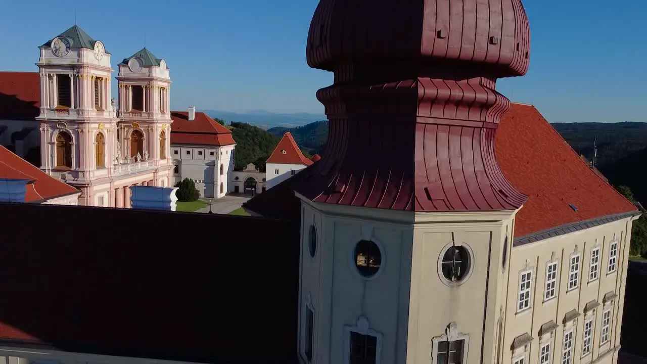 Transition from a facade of a monastery to the horizon and the blue sky