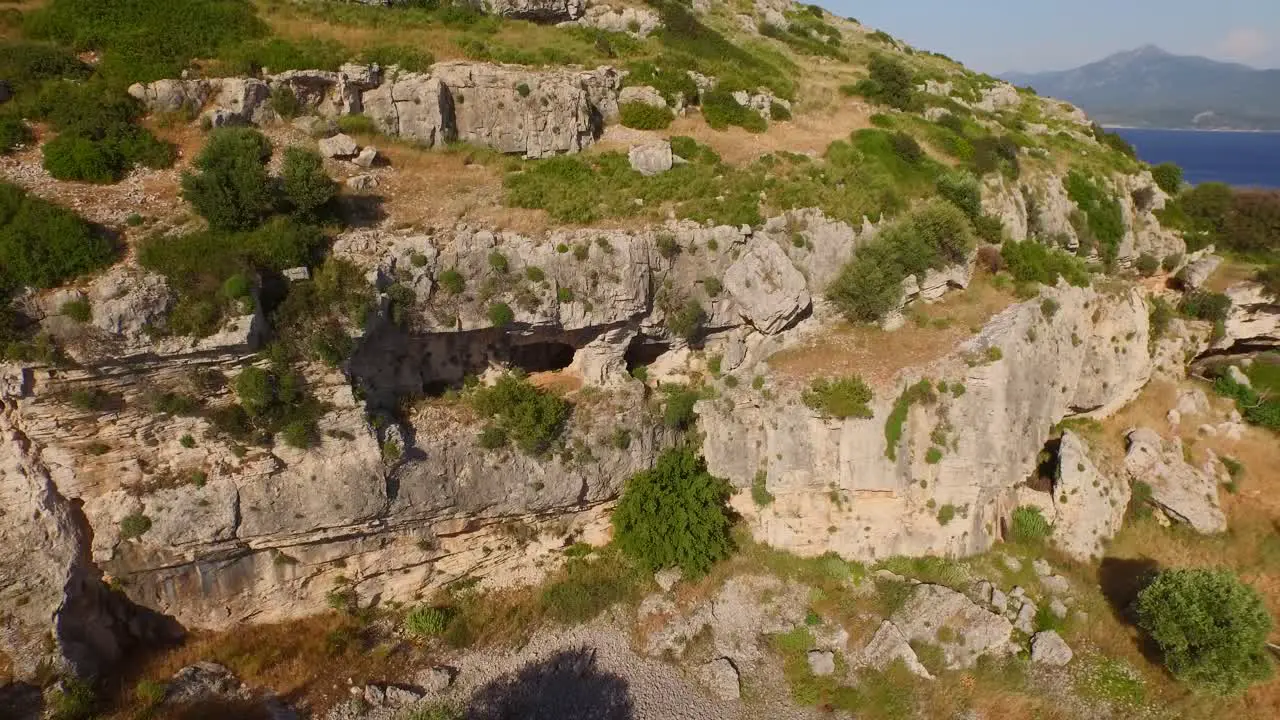 Aerial A monastery and caves in the mountains of Samos Greece