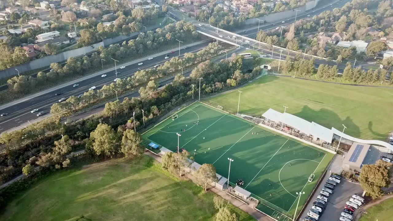 Slow pan from left to right aerial drone footage of Elgar Park field hockey ground and surrounds