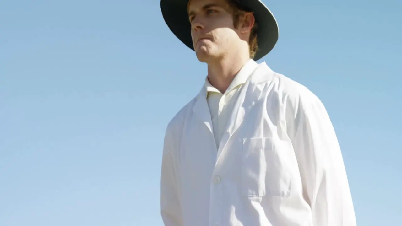 Cricket umpire signaling out sign during match