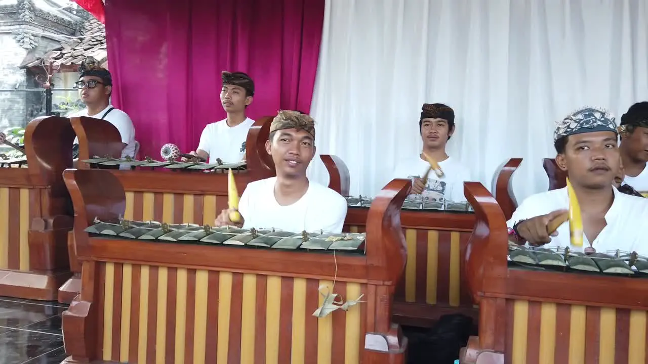 Elegant Music Orchestra Performs Gamelan Balinese Wedding Ceremony Bali Culture at Family Temple Indonesia Southeast Asia