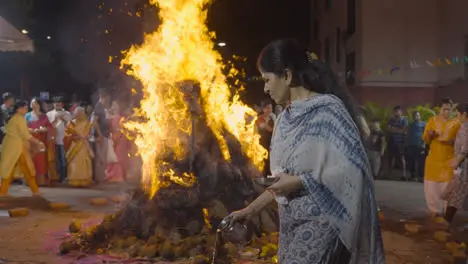 People Celebrating Hindu Festival Of Holi With Bonfire In Mumbai India 26