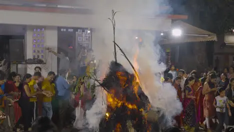 People Celebrating Hindu Festival Of Holi With Bonfire In Mumbai India 2