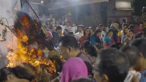 People Celebrating Hindu Festival Of Holi With Bonfire In Mumbai India 1