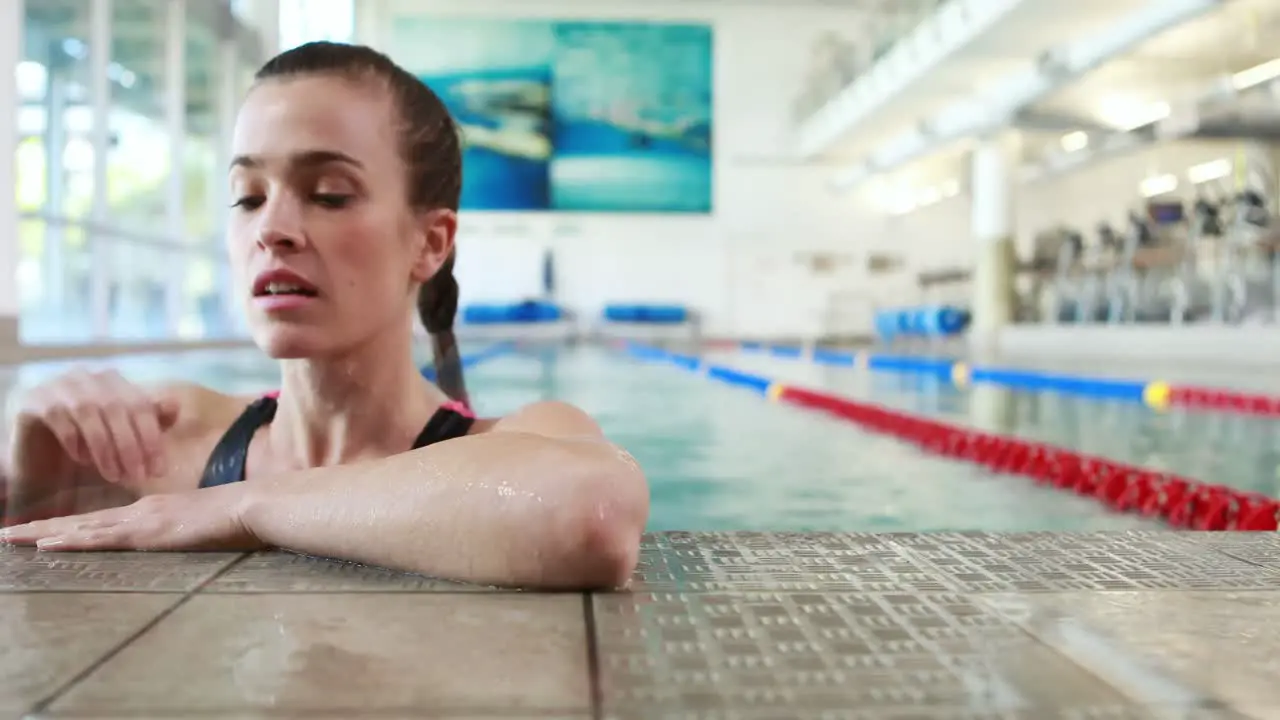 Fit woman swimming in pool