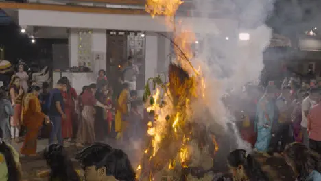 People Celebrating Hindu Festival Of Holi With Bonfire In Mumbai India 25