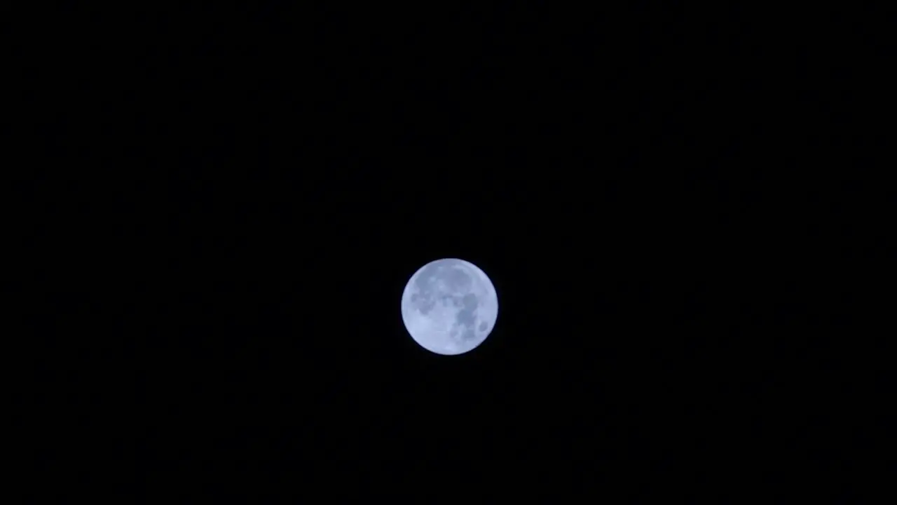 close up of Night view the moon moves across the night