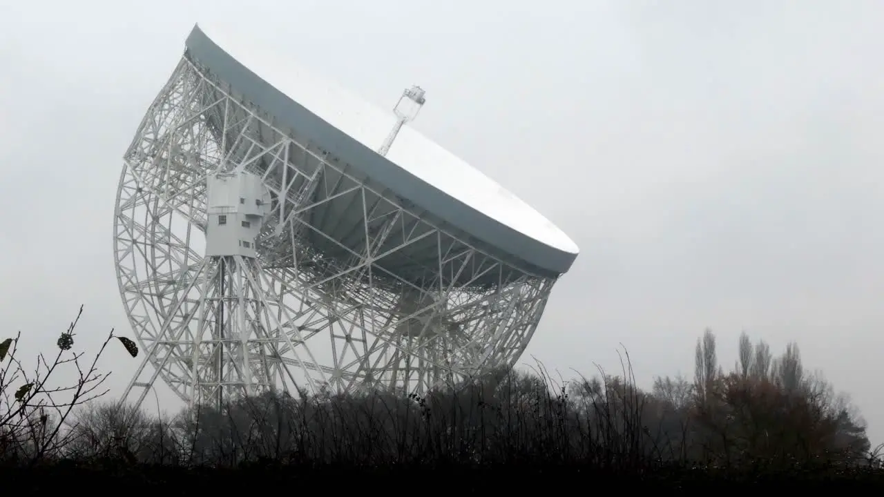 Lovell astronomy telescope dish misty morning science technology mid shot