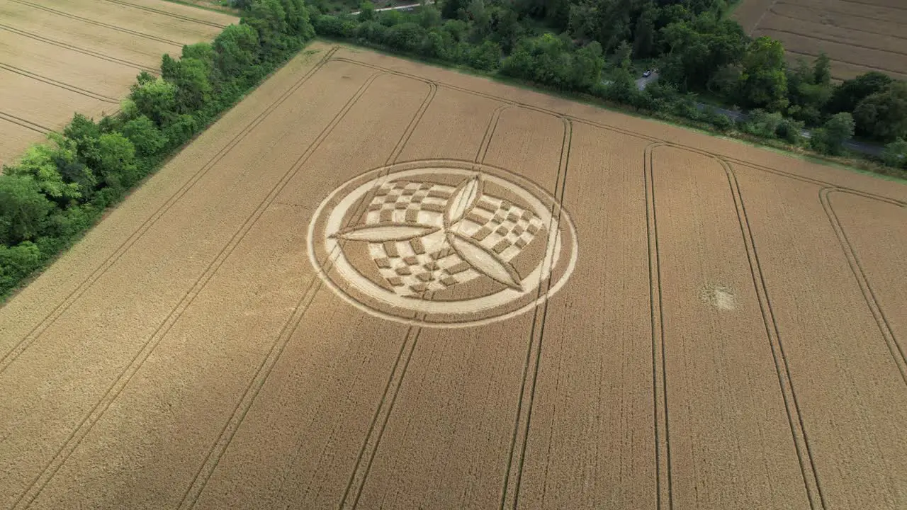 Looking down over South Wonston trinity crop circle vandalism aerial view orbiting windy Hampshire golden wheat field