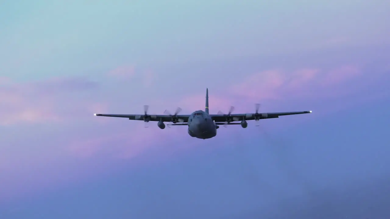 C-130 Hercules 153Rd Airlift Wing Wyoming National Guard Flys At Dusk Releasing Flares On Training Mission