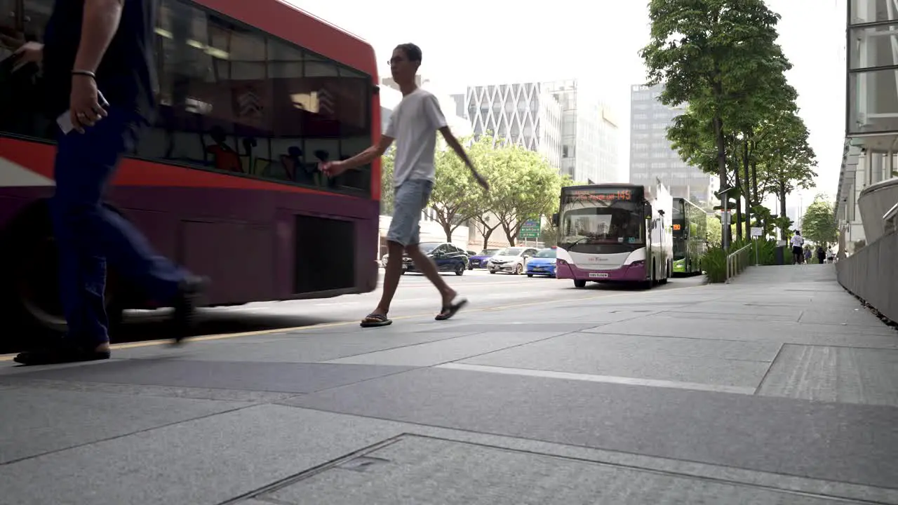 Local Double Decker Buses Arriving At Clarke Quay Station Bus Stop In Singapore With Singaporeans Walking Past