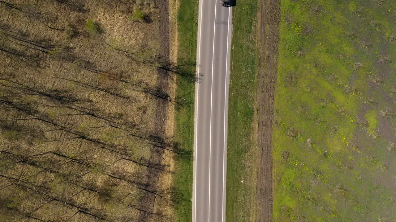 Cistern truck on the road aerial shot from top down perspective