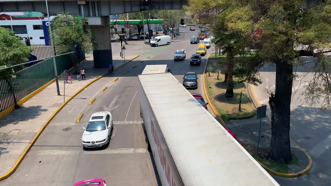 Morning Traffic White Lorries Trucks Going Past On Avenue Patriotismo Viewed From Molino Des Chiles Y Harinas In Mexico City