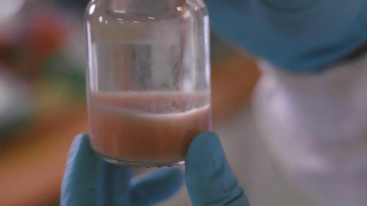 Chemical liquid in a glass vial in 4k