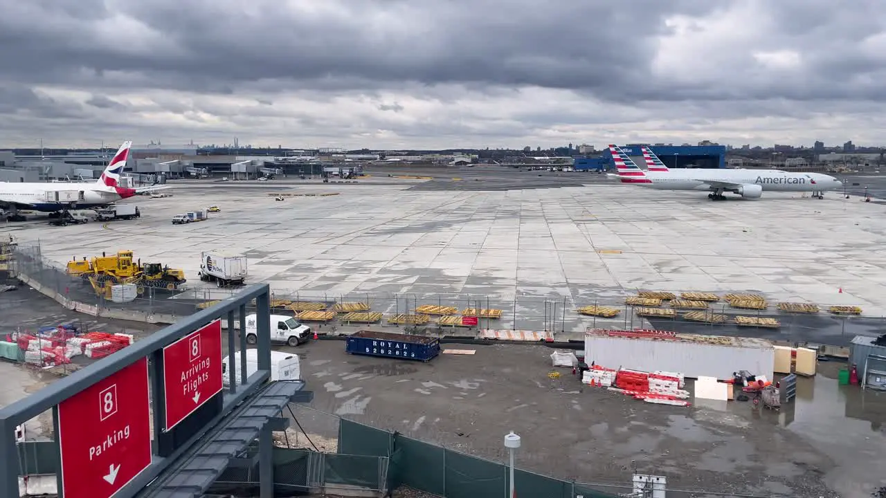 SLOW MOTION SHOT OF jfk airport in manhattan in distant view on a cloudy day