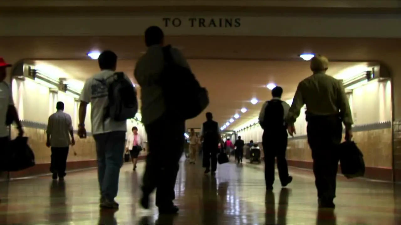 Timelapse of crowds walking in an underground train station