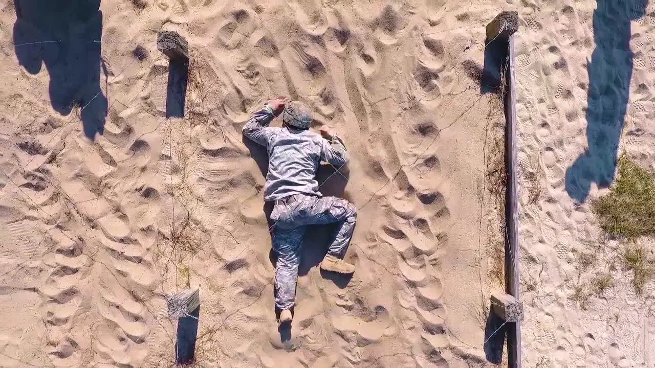 An Aerial Over Us Army Soldiers Going Through Obstacle Course Exercises In Basic Training 3