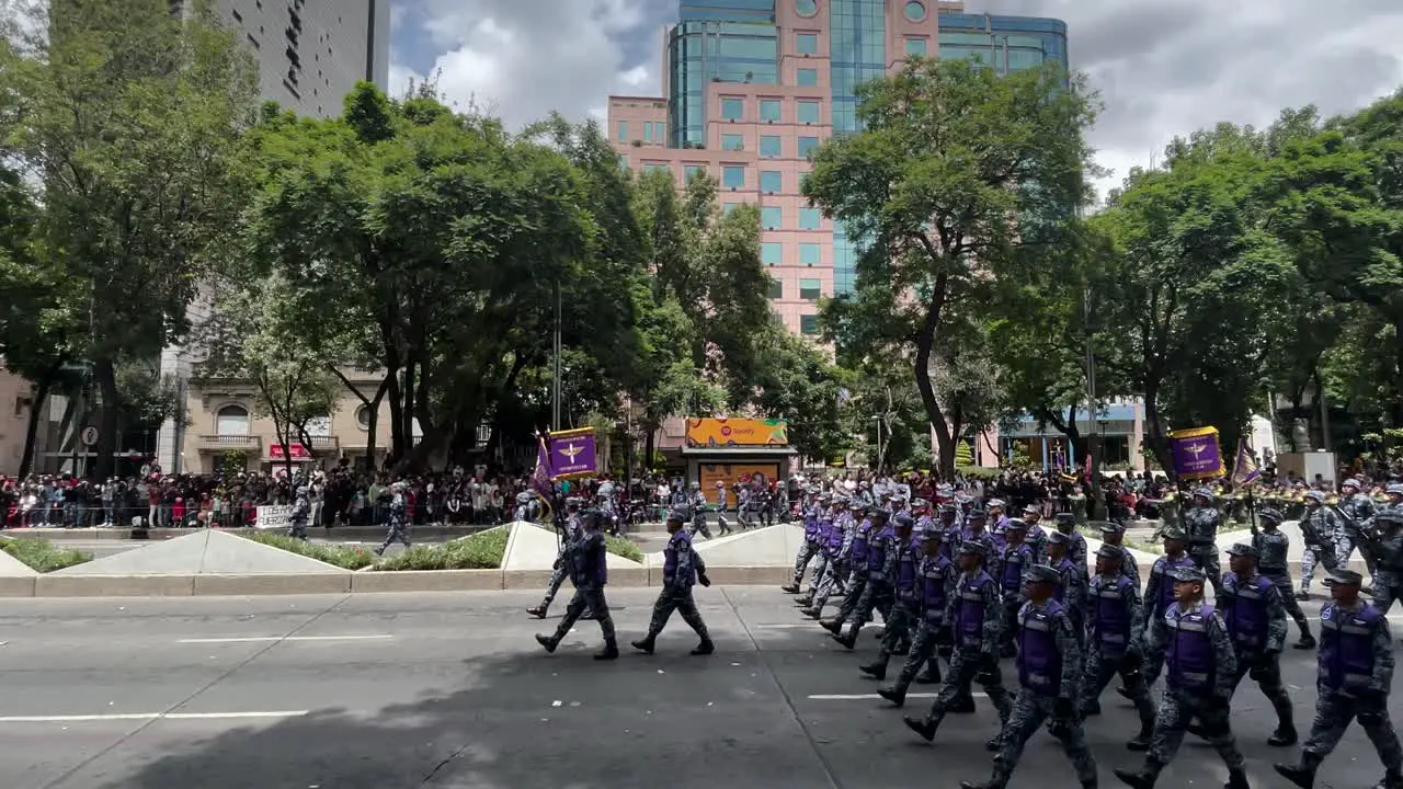 shot of the advance of the platoons of gunmen during the parade of the mexican army in mexico city