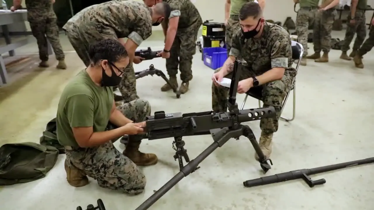 A Female Marine With Combat Logistics Battalion 4 Takes A Machine Gun Class At Camp Kinser Okinawa Japan