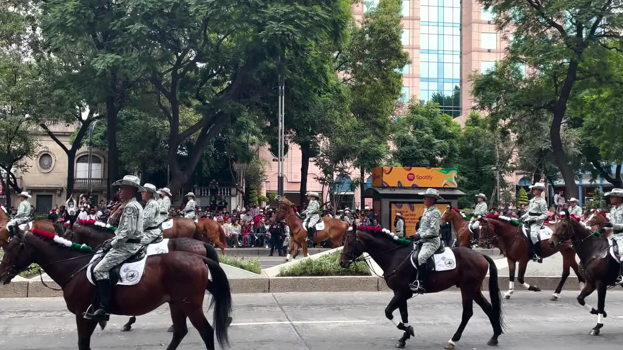 shot of the advance of the mounted forces of the civil guard during the military parade in mexico city