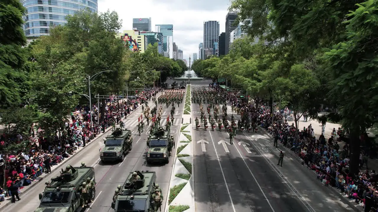 drone shot of mexican army tanks approaching in the military parade of Mexico city