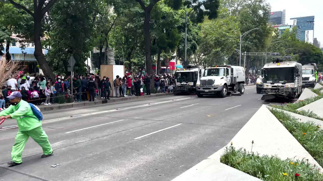 shot of the cleaning service of the city of mexico supporting the work of the military parade of the city of mexico